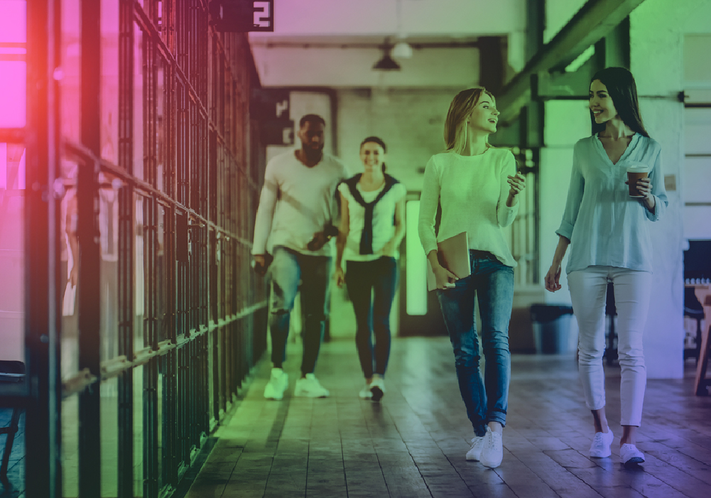 people walking in an office