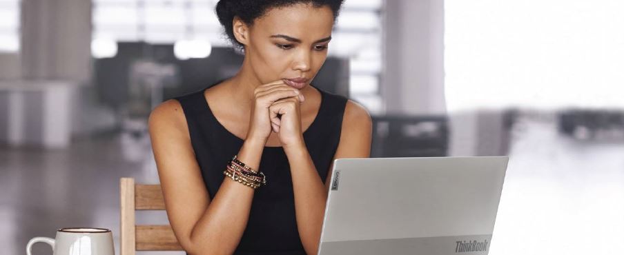 women working on a laptop