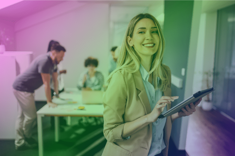Professionals in an office using Microsoft 365 M365 managed services.